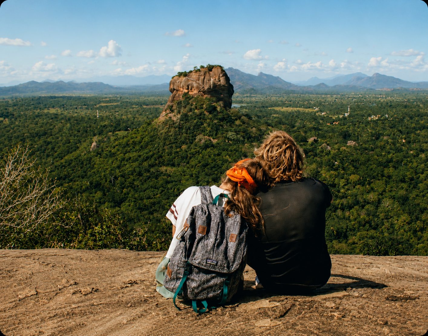 Couple looking out at Sigiriya Rock Fortress in Sri Lanka